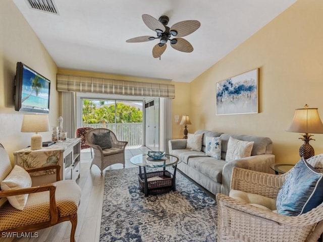 850 Elkhorn Ct Unit 222, Marco Island, FL 34145 - living room featuring wood finished floors, a ceiling fan, and vaulted ceiling