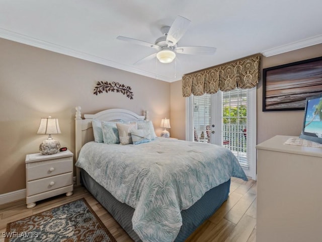 850 Elkhorn Ct Unit 222, Marco Island, FL 34145 - bedroom with access to exterior, wood finished floors, ornamental molding, a ceiling fan, and baseboards