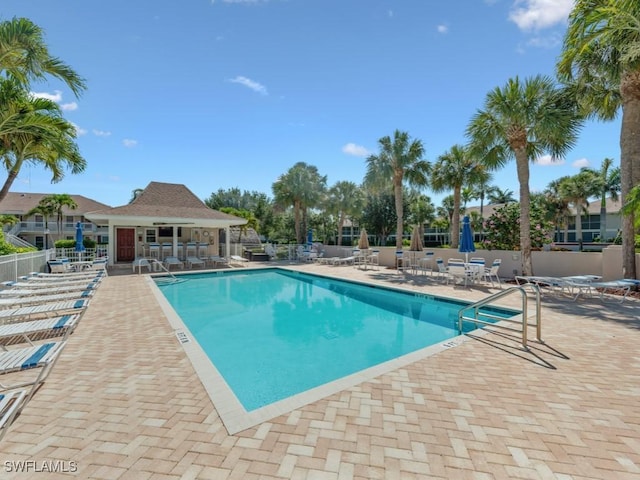 850 Elkhorn Ct Unit 222, Marco Island, FL 34145 - community pool with a patio