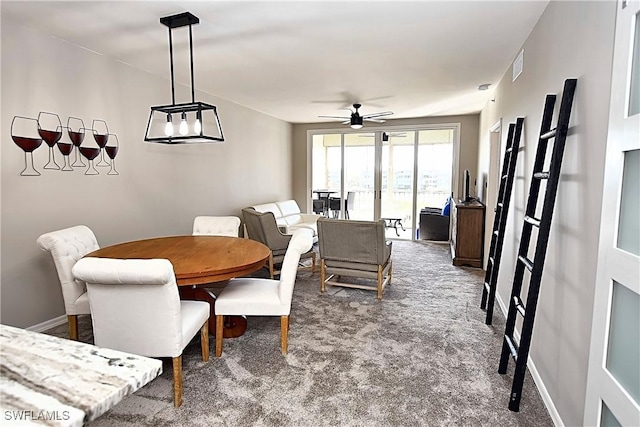 14911 Hole In 1 Cir Unit 310, Fort Myers, FL 33919 - dining space featuring carpet, ceiling fan, and baseboards