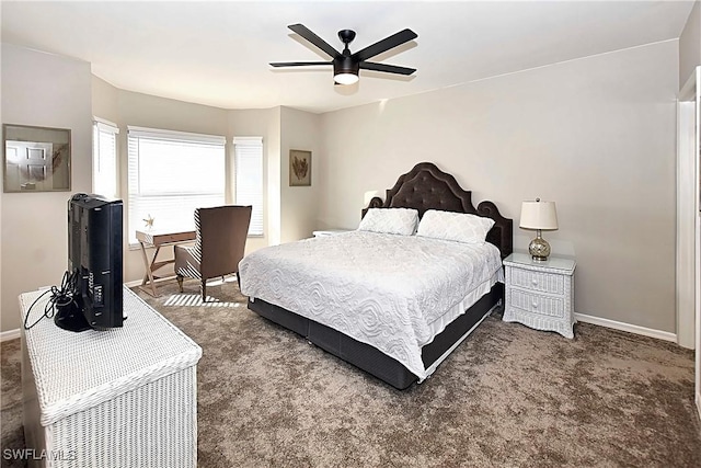 14911 Hole In 1 Cir Unit 310, Fort Myers, FL 33919 - bedroom with carpet floors, baseboards, and ceiling fan