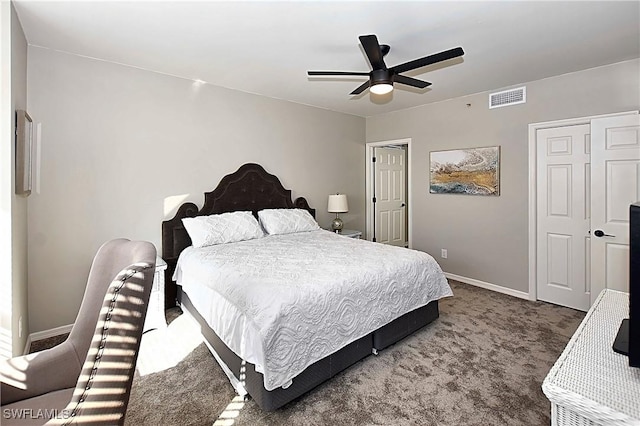 14911 Hole In 1 Cir Unit 310, Fort Myers, FL 33919 - bedroom with carpet flooring, baseboards, and ceiling fan