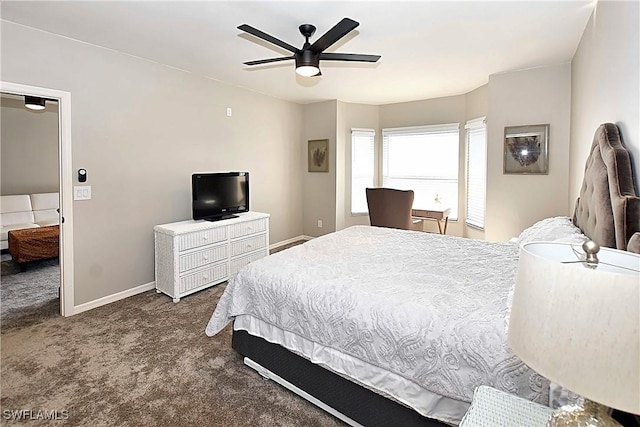 14911 Hole In 1 Cir Unit 310, Fort Myers, FL 33919 - carpeted bedroom with baseboards and ceiling fan