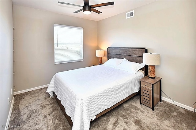 14911 Hole In 1 Cir Unit 310, Fort Myers, FL 33919 - carpeted bedroom featuring baseboards and a ceiling fan