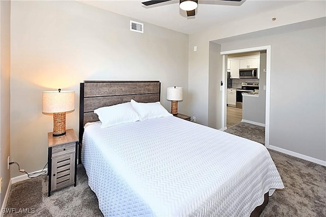 14911 Hole In 1 Cir Unit 310, Fort Myers, FL 33919 - carpeted bedroom with baseboards and ceiling fan