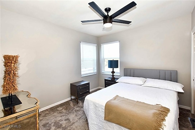 14911 Hole In 1 Cir Unit 310, Fort Myers, FL 33919 - carpeted bedroom featuring baseboards and a ceiling fan