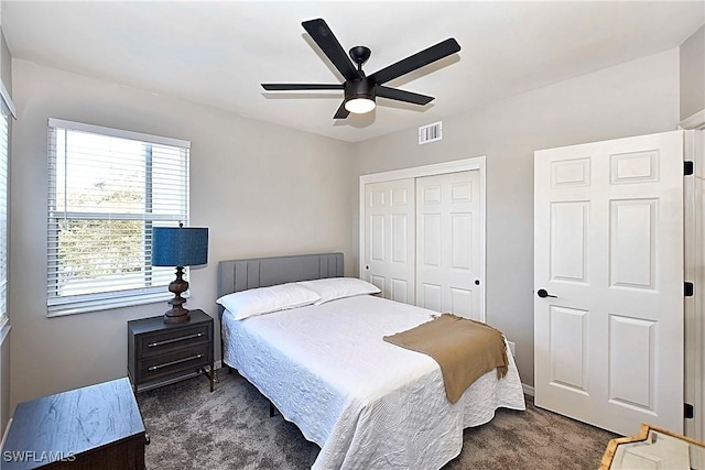 14911 Hole In 1 Cir Unit 310, Fort Myers, FL 33919 - bedroom featuring carpet flooring, a closet, a ceiling fan, and baseboards