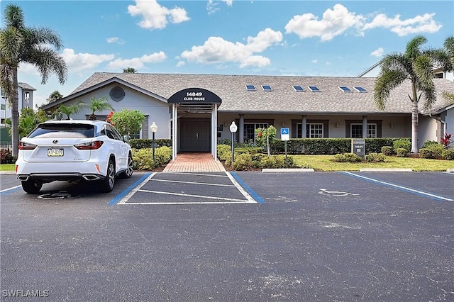 14911 Hole In 1 Cir Unit 310, Fort Myers, FL 33919 - view of front of home featuring uncovered parking