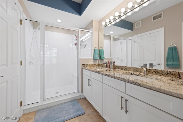 10115 Colonial Country Club Blvd Unit 2110, Fort Myers, FL 33913 - bathroom with a shower stall, tile patterned flooring, and double vanity