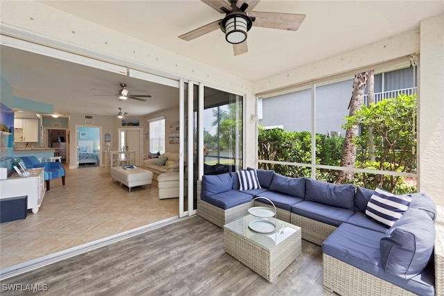 10115 Colonial Country Club Blvd Unit 2110, Fort Myers, FL 33913 - sunroom featuring ceiling fan and outdoor lounge area