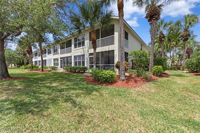 10115 Colonial Country Club Blvd Unit 2110, Fort Myers, FL 33913 - back of house featuring stucco siding and a yard