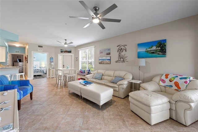 10115 Colonial Country Club Blvd Unit 2110, Fort Myers, FL 33913 - living area featuring ceiling fan and light tile patterned flooring