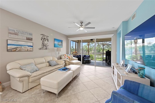 10115 Colonial Country Club Blvd Unit 2110, Fort Myers, FL 33913 - living area with a ceiling fan and light tile patterned floors