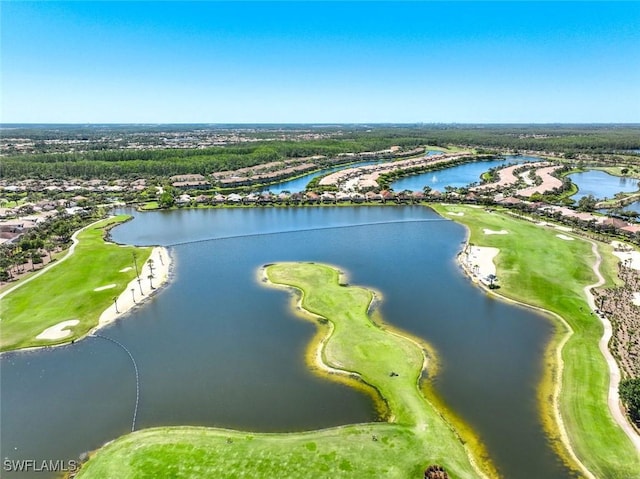 bird's eye view of a local golf course and a nearby body of water
