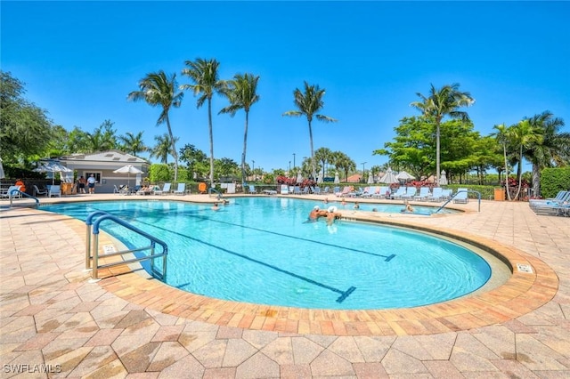 community pool featuring a patio area