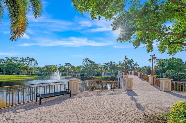 view of home's community featuring a water view