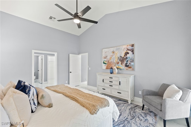12721 Kelly Sands Way, Fort Myers, FL 33908 - bedroom featuring high vaulted ceiling, baseboards, ceiling fan, and ensuite bath