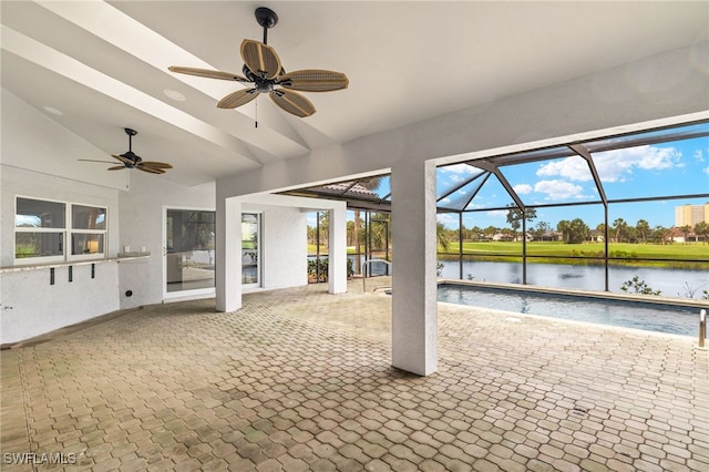12721 Kelly Sands Way, Fort Myers, FL 33908 - view of patio with a water view, ceiling fan, an outdoor pool, and a lanai