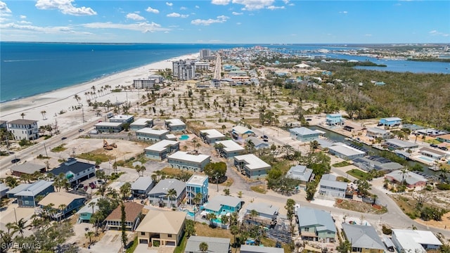 aerial view of property and surrounding area with expansive coastline
