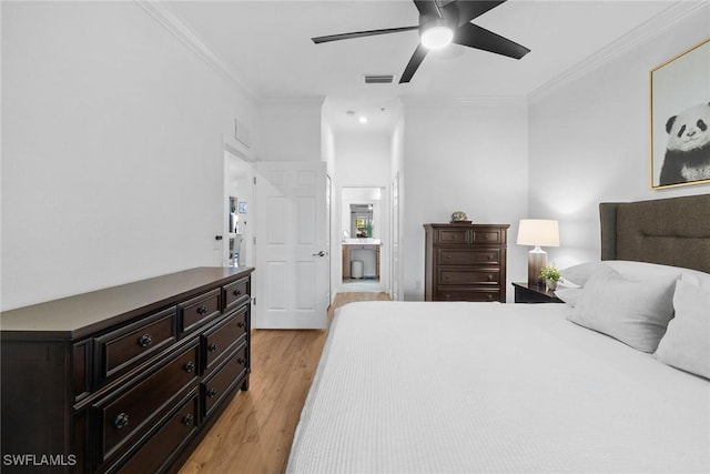 9510 Avellino Way Unit 1924, Naples, FL 34113 - bedroom with light wood-style flooring, ornamental molding, connected bathroom, and ceiling fan
