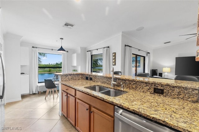 9510 Avellino Way Unit 1924, Naples, FL 34113 - kitchen with ornamental molding, stainless steel dishwasher, light stone countertops, brown cabinets, and light tile patterned floors