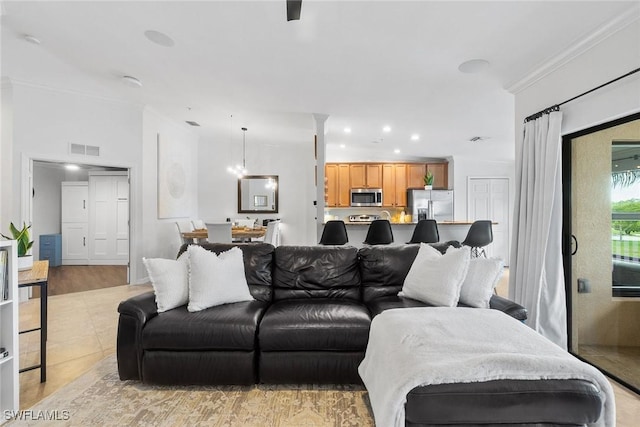 9510 Avellino Way Unit 1924, Naples, FL 34113 - living room with recessed lighting and crown molding