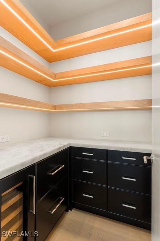 storage area with beverage cooler