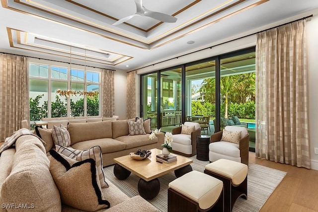 lobby with a water view and crown molding