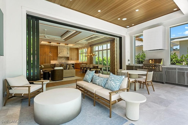 community lobby featuring wooden ceiling and recessed lighting