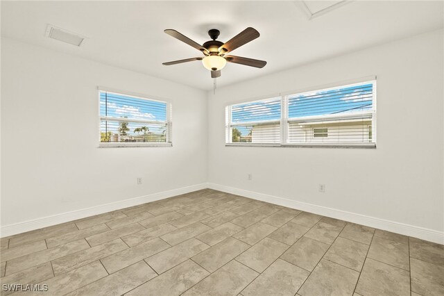 13846 Sleepy Hollow Ln, Fort Myers, FL 33905 - tiled empty room with a ceiling fan and baseboards