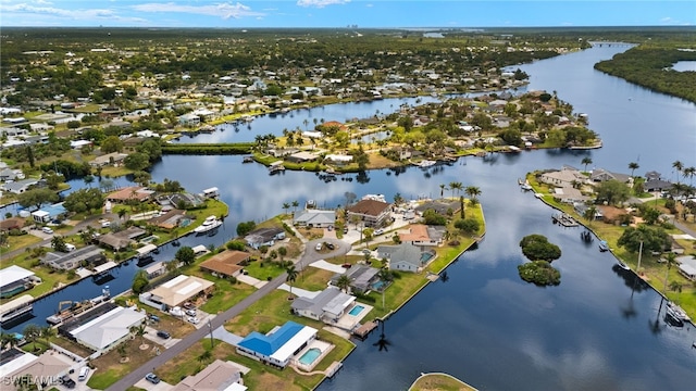 13846 Sleepy Hollow Ln, Fort Myers, FL 33905 - aerial view of property and surrounding area with a large body of water and nearby suburban area