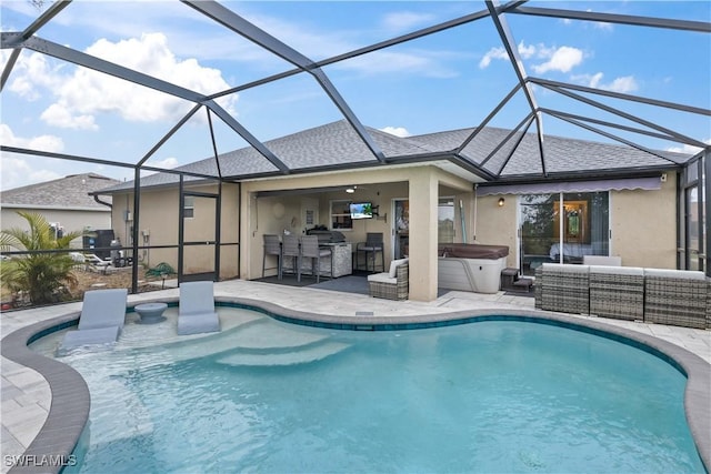 927 NW 12th Ter, Cape Coral, FL 33993 - swimming pool with a patio area, a hot tub, outdoor lounge area, an outdoor kitchen, and a lanai