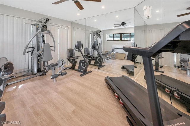 gym with ceiling fan, wood finished floors, and recessed lighting