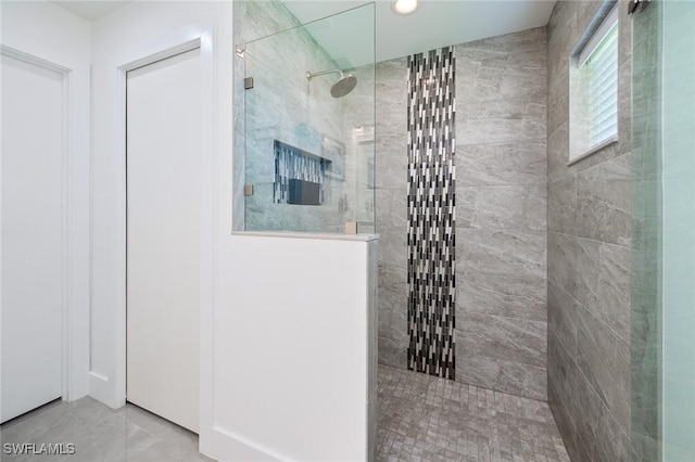 bathroom with a walk in shower