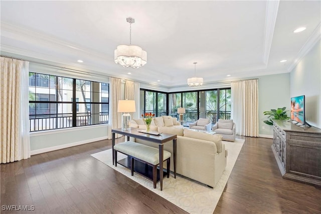 2745 Tiburon Blvd E Unit 102, Naples, FL 34109 - living area featuring a chandelier, crown molding, wood finished floors, recessed lighting, and a raised ceiling