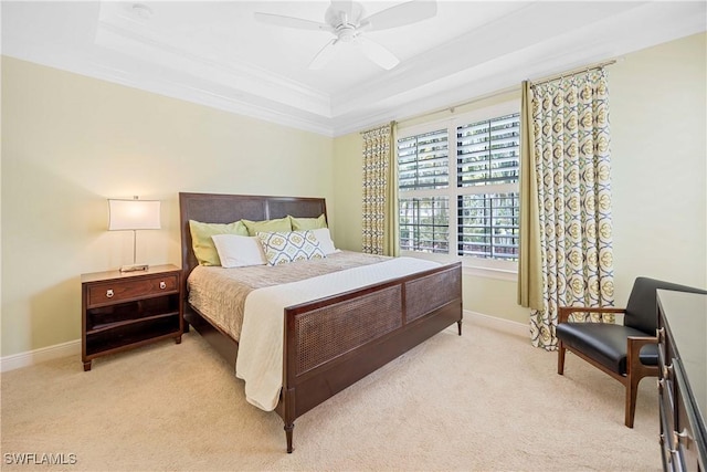 2745 Tiburon Blvd E Unit 102, Naples, FL 34109 - bedroom with light colored carpet, crown molding, a raised ceiling, and ceiling fan