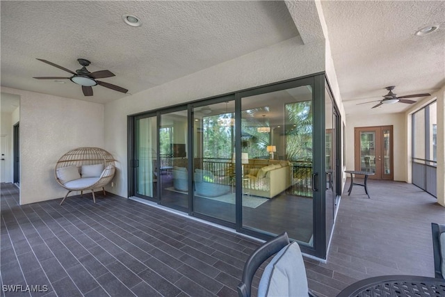 2745 Tiburon Blvd E Unit 102, Naples, FL 34109 - wooden deck featuring a ceiling fan