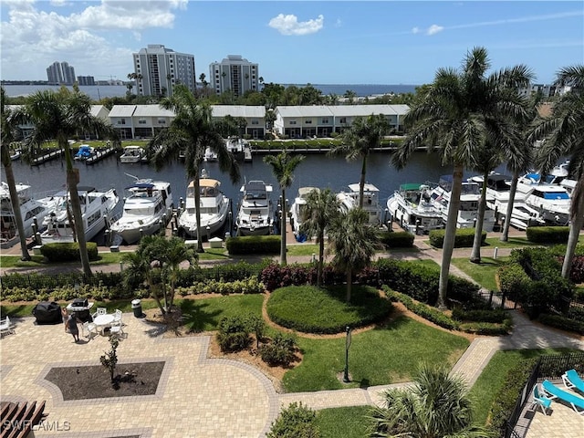 view of community with a water view