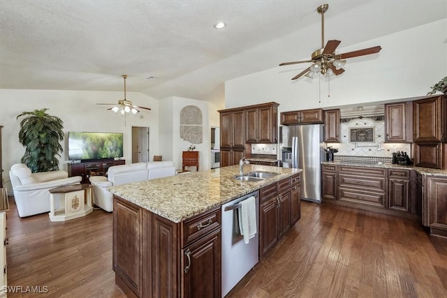 6721 Southwell Dr, Fort Myers, FL 33966 - kitchen with ceiling fan, stainless steel appliances, a sink, lofted ceiling, and dark wood-style floors