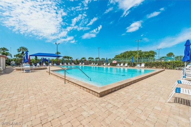 6721 Southwell Dr, Fort Myers, FL 33966 - community pool featuring fence and a patio