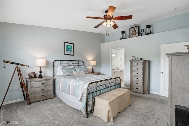14560 Daffodil Dr Unit 905, Fort Myers, FL 33919 - bedroom with carpet flooring, baseboards, ceiling fan, and connected bathroom