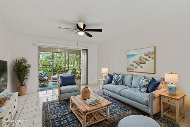 1704 Kings Lake Blvd Unit 105, Naples, FL 34112 - living area featuring a ceiling fan and light tile patterned floors