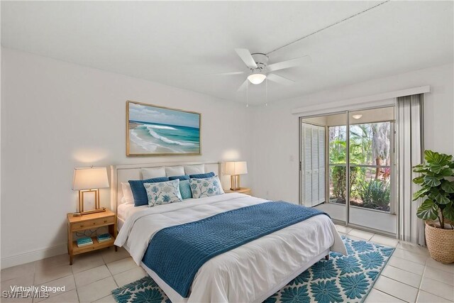 1704 Kings Lake Blvd Unit 105, Naples, FL 34112 - bedroom with access to exterior, light tile patterned floors, baseboards, and a ceiling fan