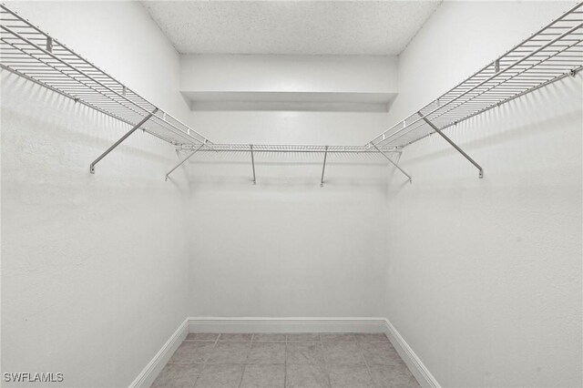 1704 Kings Lake Blvd Unit 105, Naples, FL 34112 - view of walk in closet