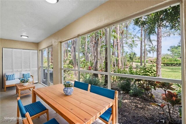 1704 Kings Lake Blvd Unit 105, Naples, FL 34112 - view of sunroom / solarium