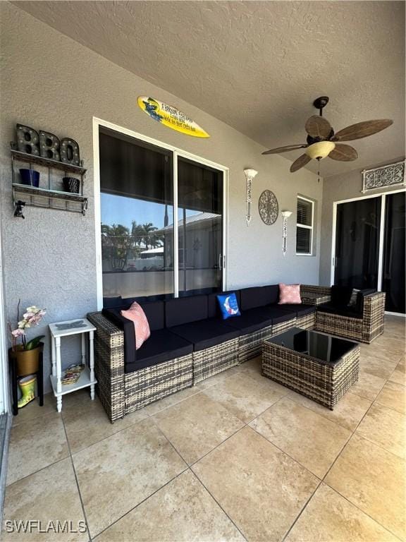 view of patio / terrace featuring a ceiling fan and outdoor lounge area