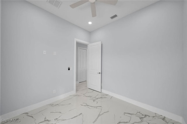 3800 11th St SW, Lee, FL 33976 - empty room with baseboards, light marble finish floors, a ceiling fan, and recessed lighting
