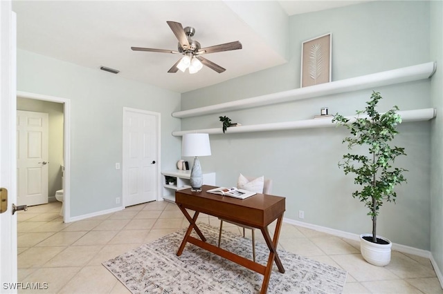 10334 Quail Crown Dr, Naples, FL 34119 - office space with a ceiling fan, light tile patterned flooring, and baseboards