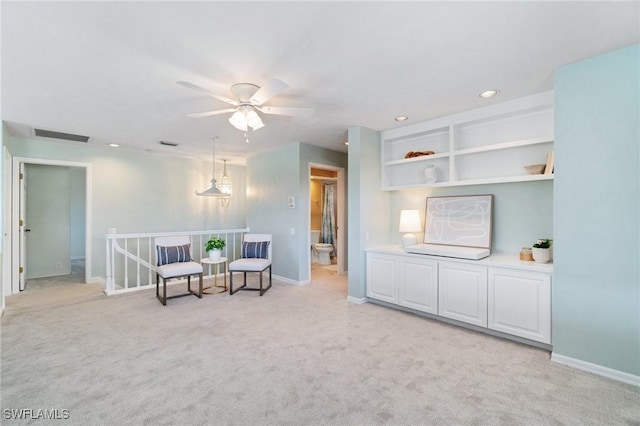 10334 Quail Crown Dr, Naples, FL 34119 - living area with an upstairs landing, light colored carpet, baseboards, a ceiling fan, and recessed lighting