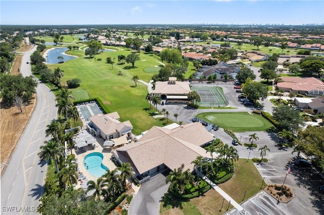 10334 Quail Crown Dr, Naples, FL 34119 - aerial overview of property's location with a nearby body of water, a golf course, nearby suburban area, and a pool